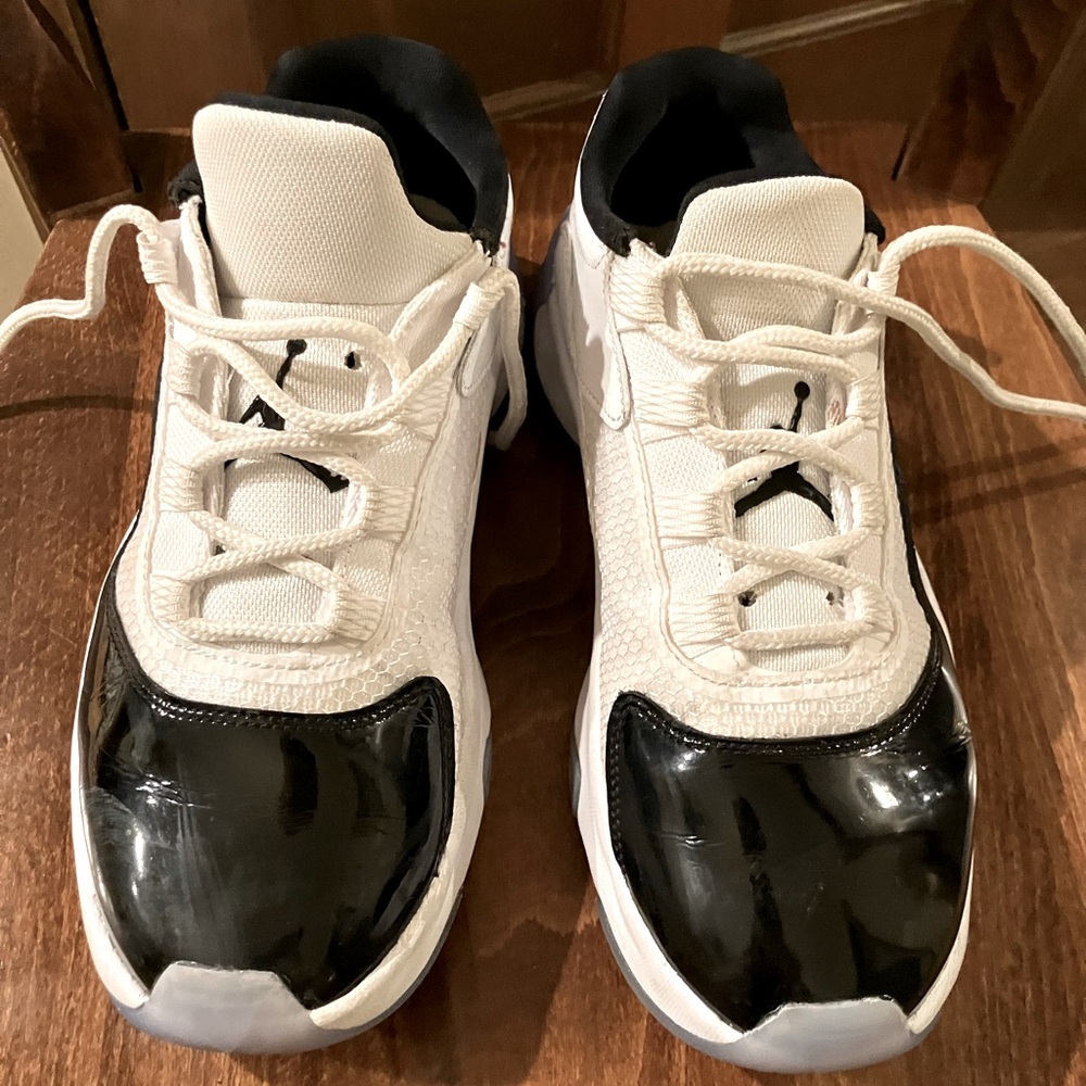 White with black patent leather air Jordan’s